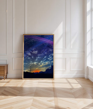Starlit night sky with colorful sunset and silhouetted landscape