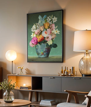 Floral arrangement in a decorative vase on a green background