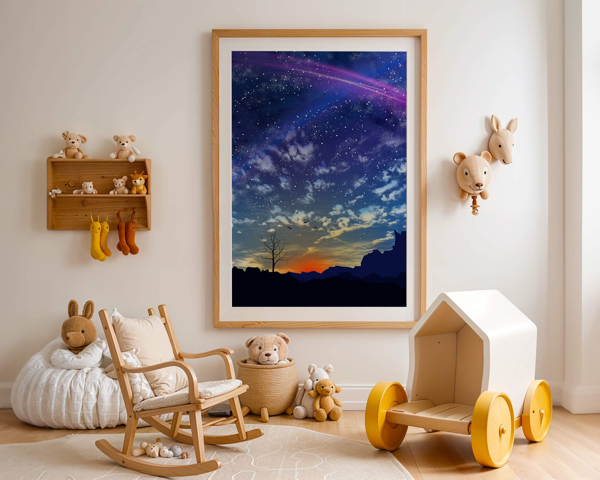 Starlit night sky with colorful sunset and silhouetted landscape