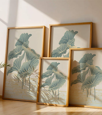 Elegant botanical illustration featuring large leaves with golden accents