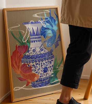 Elegant ceramic vase with vibrant fish and floral design