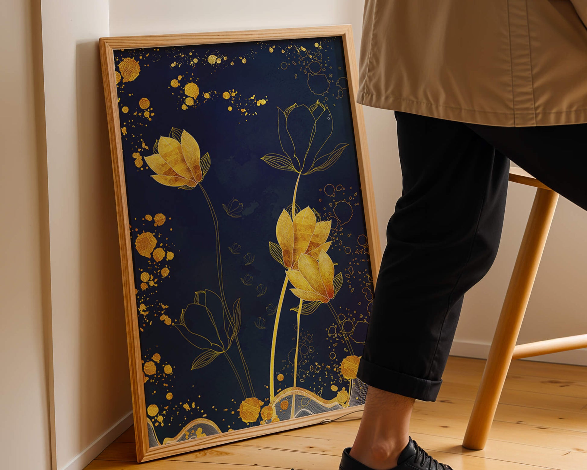 Elegant floral artwork with golden accents on deep blue background