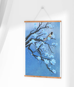 Blue Blossoms on Branch with Bird in Winter Scene