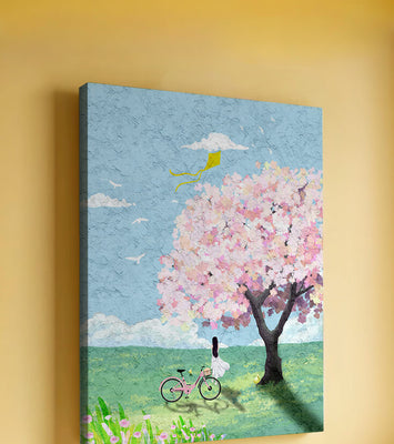 Springtime scene with cherry blossom and girl with bicycle