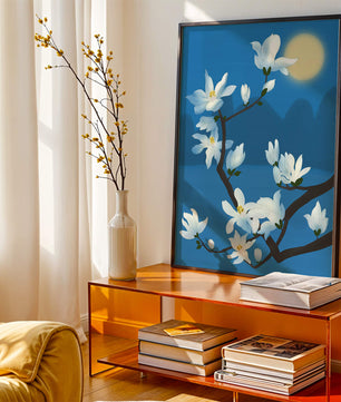 White magnolia branch under moonlight with blue background