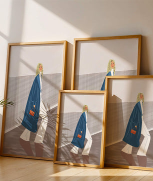 Fashionable Woman in Long Blue Coat Walking Along Corridor with Orange Handbag