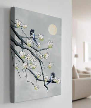 Birds on blossoming branches under a serene moonlit sky