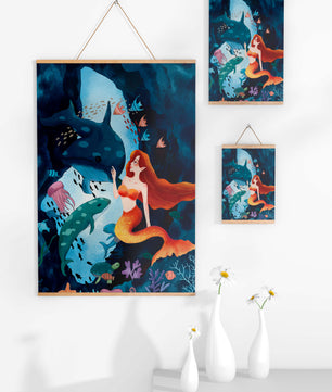Underwater scene with a mermaid interacting with sea creatures in a vibrant ocean cave