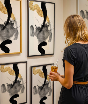 Abstract black and gold brushstrokes with textured patterns