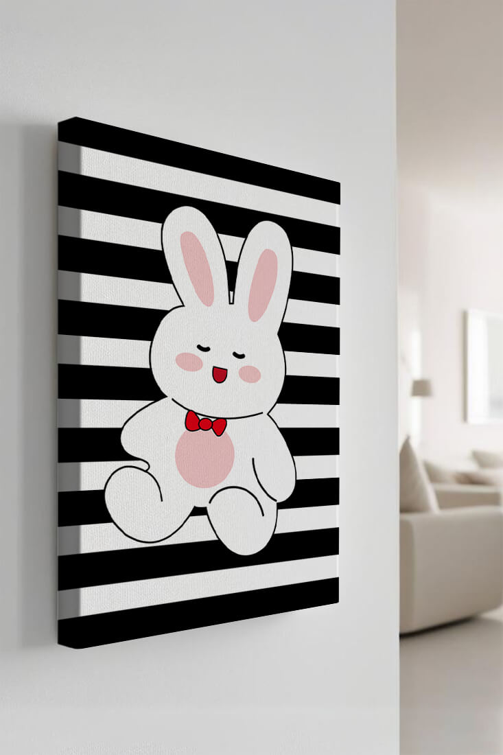 Adorable cartoon bunny with bold stripes and a red bow tie