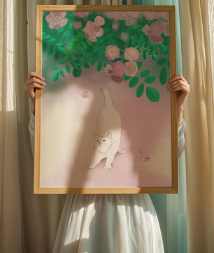 White cat stretching beneath blooming flowers in a pastel garden setting