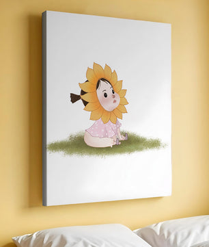 Adorable child with sunflower costume sitting on a grassy patch