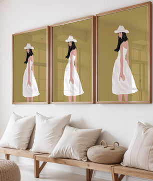 Woman in a white dress and hat on a gold background