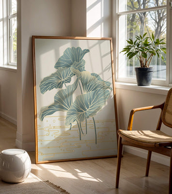 Elegant botanical illustration featuring large leaves with golden accents