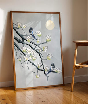 Birds on blossoming branches under a serene moonlit sky