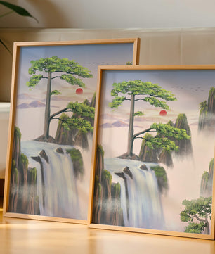 Serene landscape with flowing waterfall and sunrise