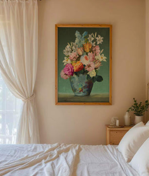 Floral arrangement in a decorative vase on a green background