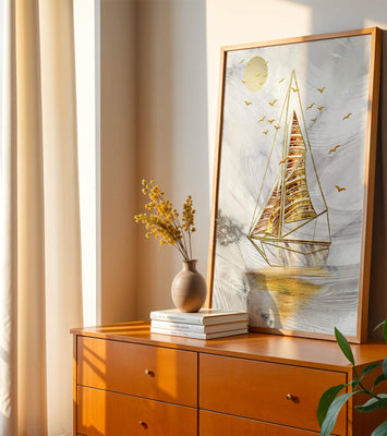 Elegant sailboat with gold elements against a textured sky