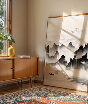 Peaceful mountain landscape with mist and rising sun