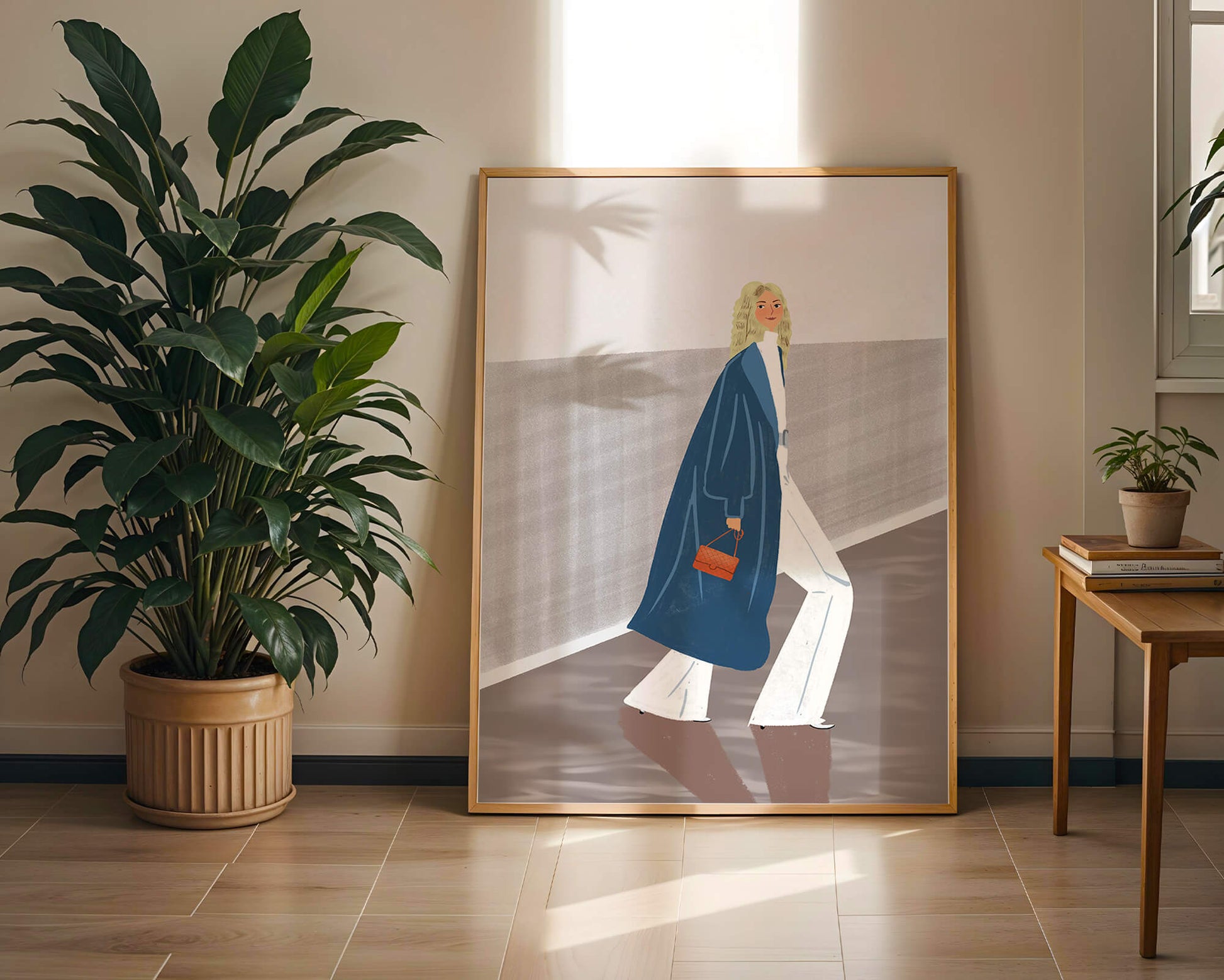 Fashionable Woman in Long Blue Coat Walking Along Corridor with Orange Handbag