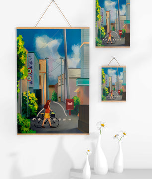 Young woman with bicycle in a quiet urban street