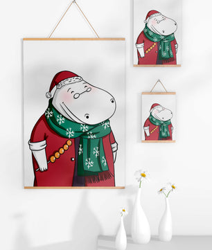 Festive hippo in a red outfit with a green snowflake scarf