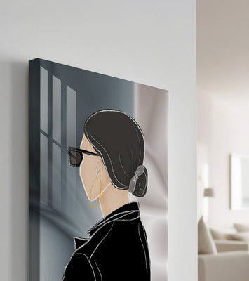 Modern woman with sunglasses and gold hoop earrings
