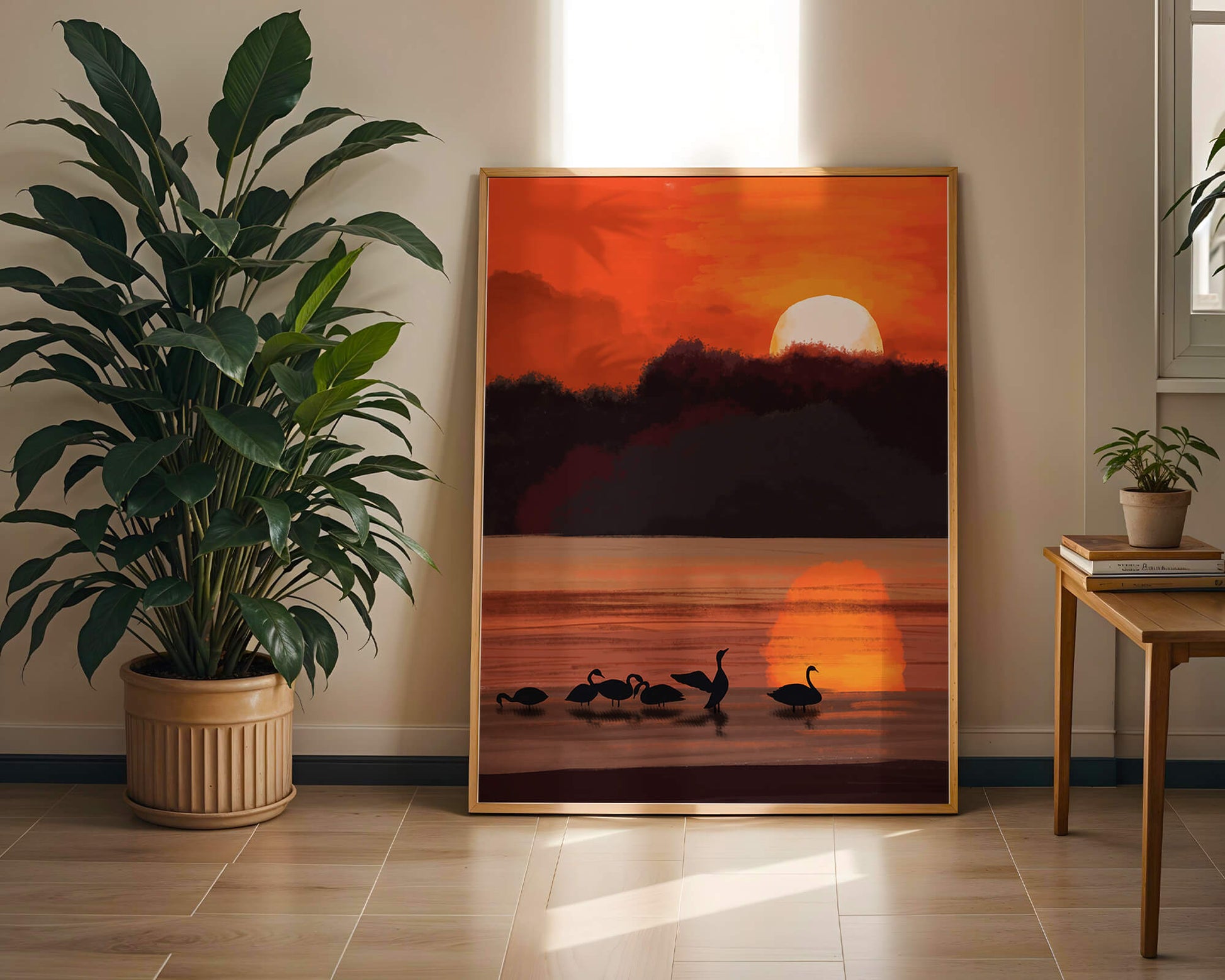 Serene sunset over a lake with silhouetted swans
