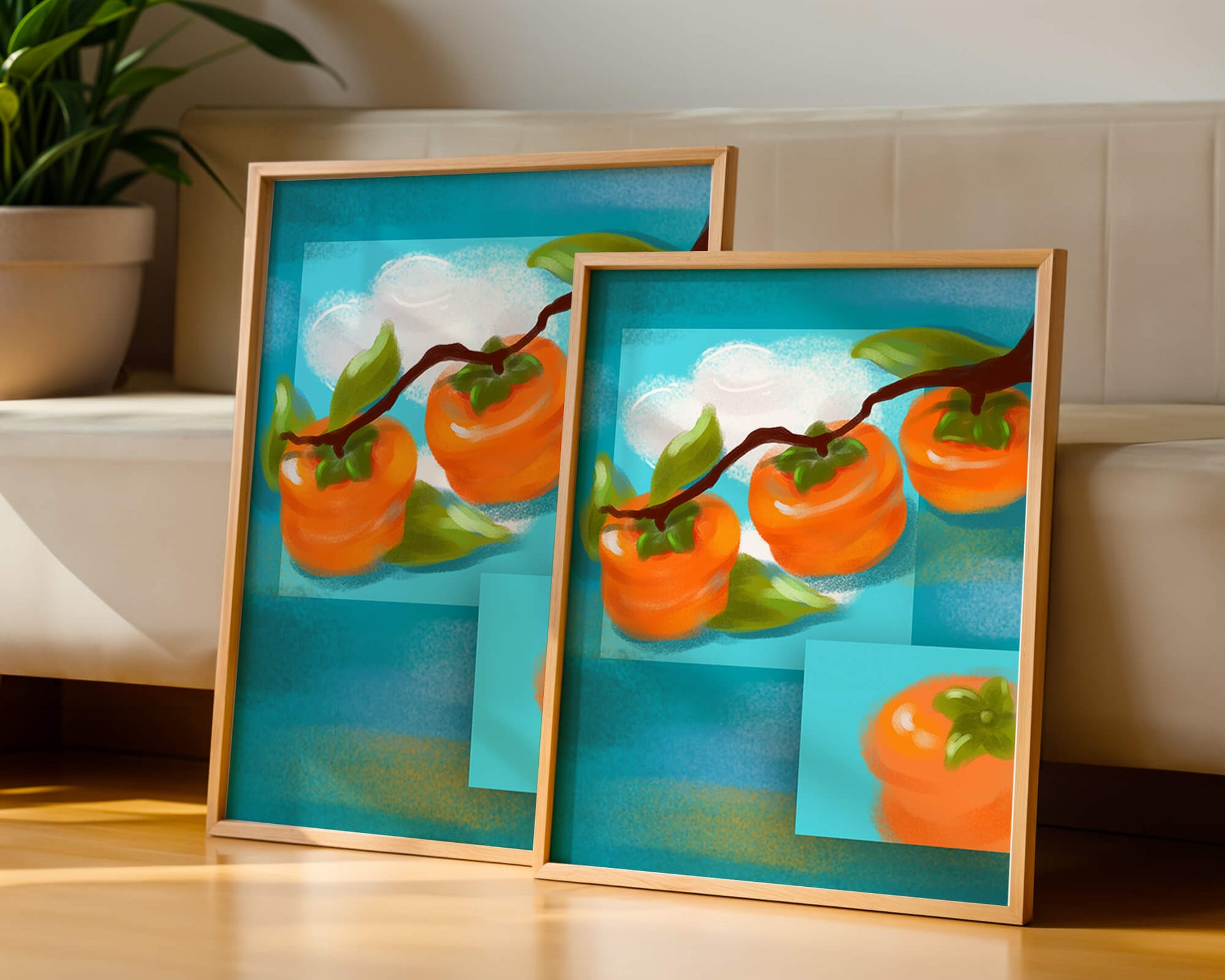 Vibrant persimmons on a branch with a blue background