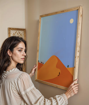 Serene desert landscape with dunes, camels, and a lone traveler under a starry sky