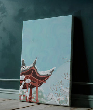 Snow-covered traditional pagoda under a clear blue sky