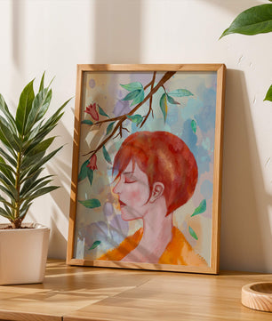 Illustrative artwork of a woman with red hair and floral branch