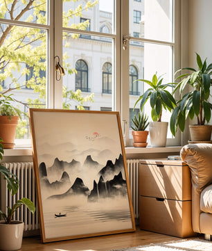 Peaceful mountain landscape with mist and rising sun