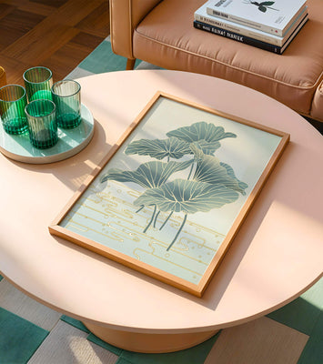 Elegant botanical illustration featuring large leaves with golden accents