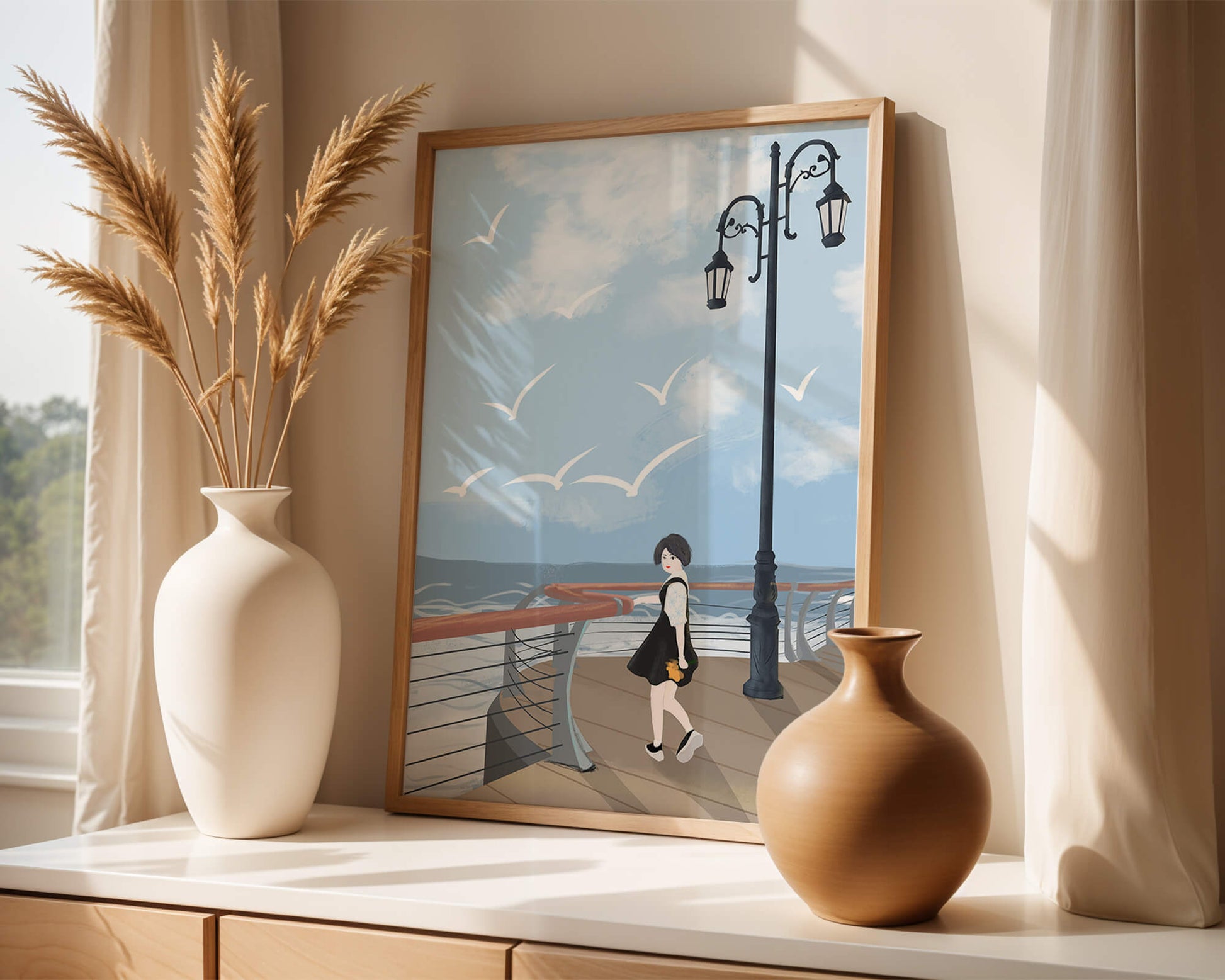 Seaside boardwalk with woman walking under street lamps amid seagulls