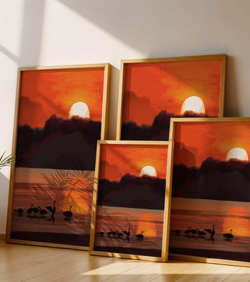 Serene sunset over a lake with silhouetted swans