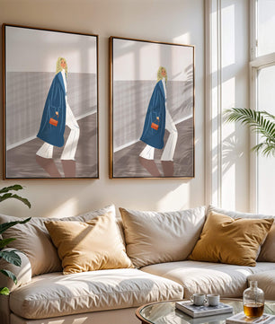 Fashionable Woman in Long Blue Coat Walking Along Corridor with Orange Handbag