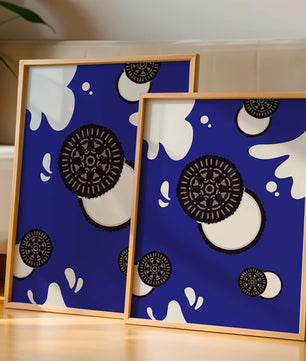 Graphic design featuring cookies and milk splashes on blue background