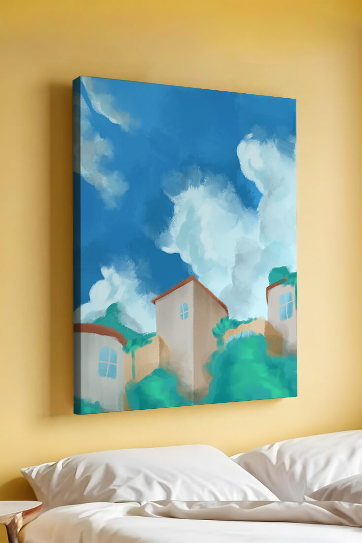 Serene landscape with houses and fluffy clouds against a blue sky