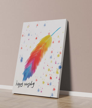 Colorful feather with inspirational message on abstract paint splatter background