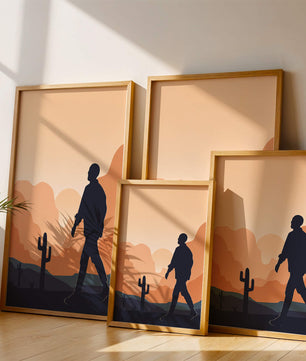 Silhouetted figure walking in desert landscape at sunset