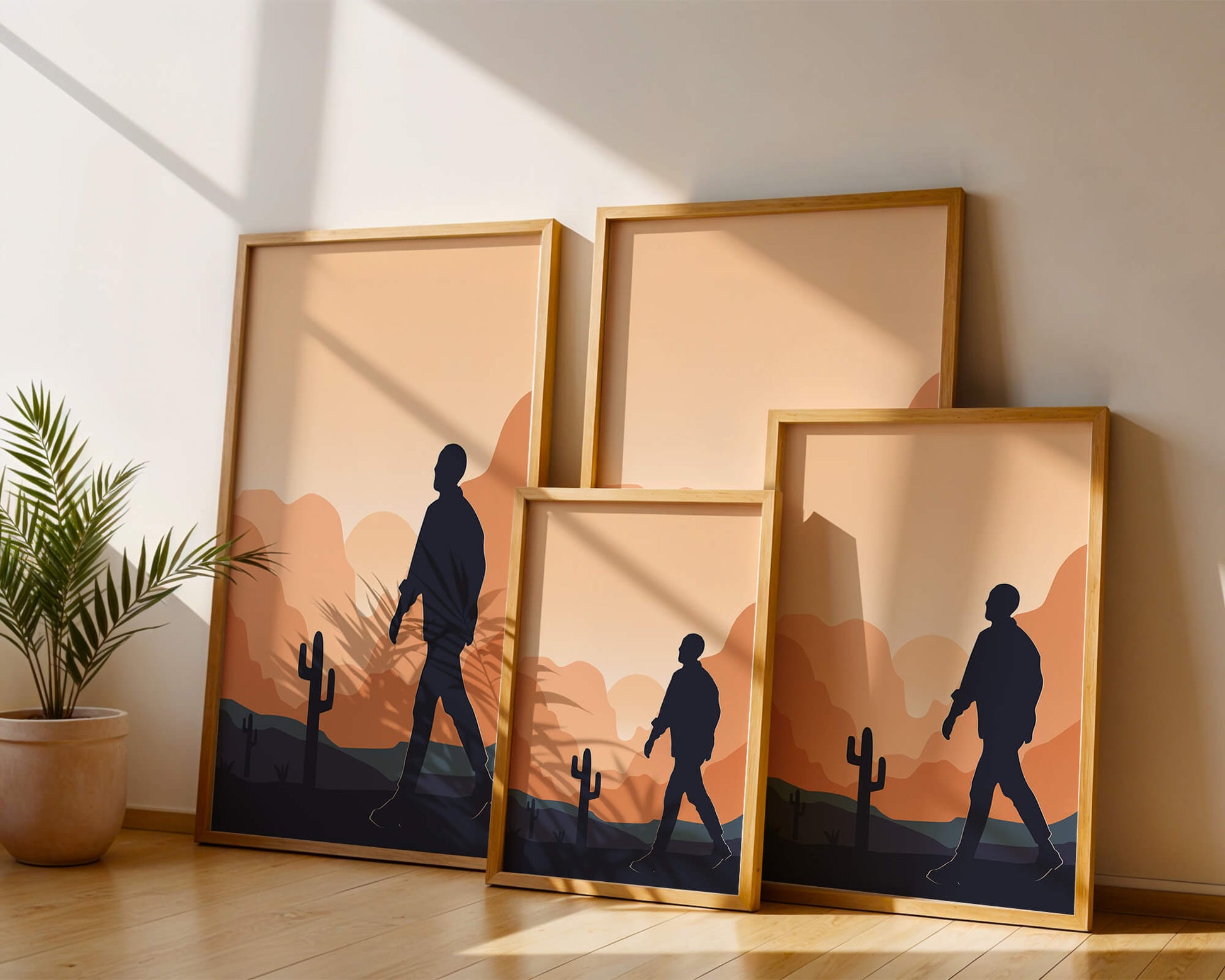 Silhouetted figure walking in desert landscape at sunset