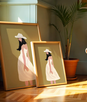 Woman in a white dress and hat on a gold background