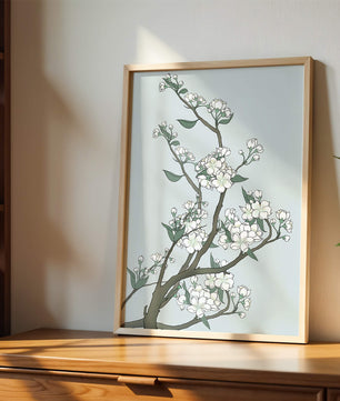 Delicate cherry blossoms on a soft blue background