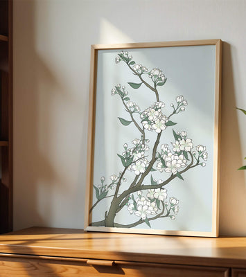 Delicate cherry blossoms on a soft blue background
