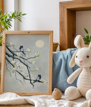 Birds on blossoming branches under a serene moonlit sky