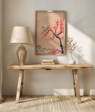 Elegant crane on cherry blossom tree with mountainous background