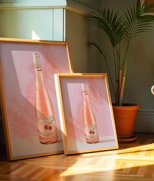 Illustrated wine bottle with a cherry label on pink background
