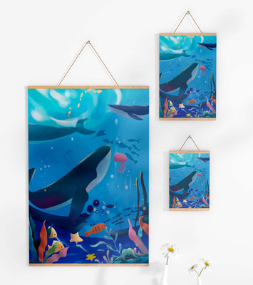 Underwater scene with whales, fish, and coral reef