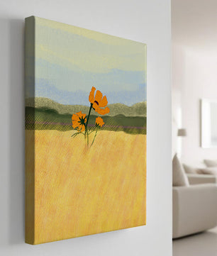 Orange Flowers in a Golden Field with Mountains and Blue Sky